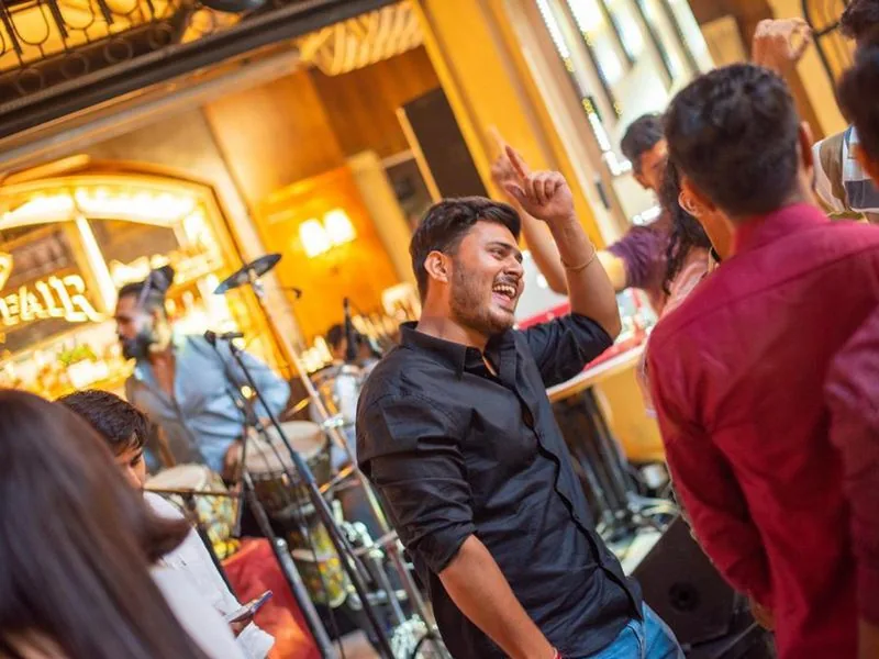 A colleague dancing at an evening team event