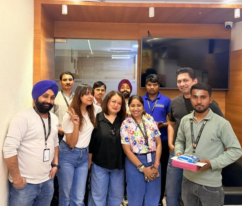 VMS colleagues celebrating Holi together at the office